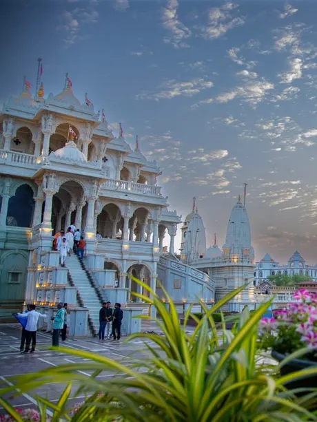 The mandir and its gardens at sunset